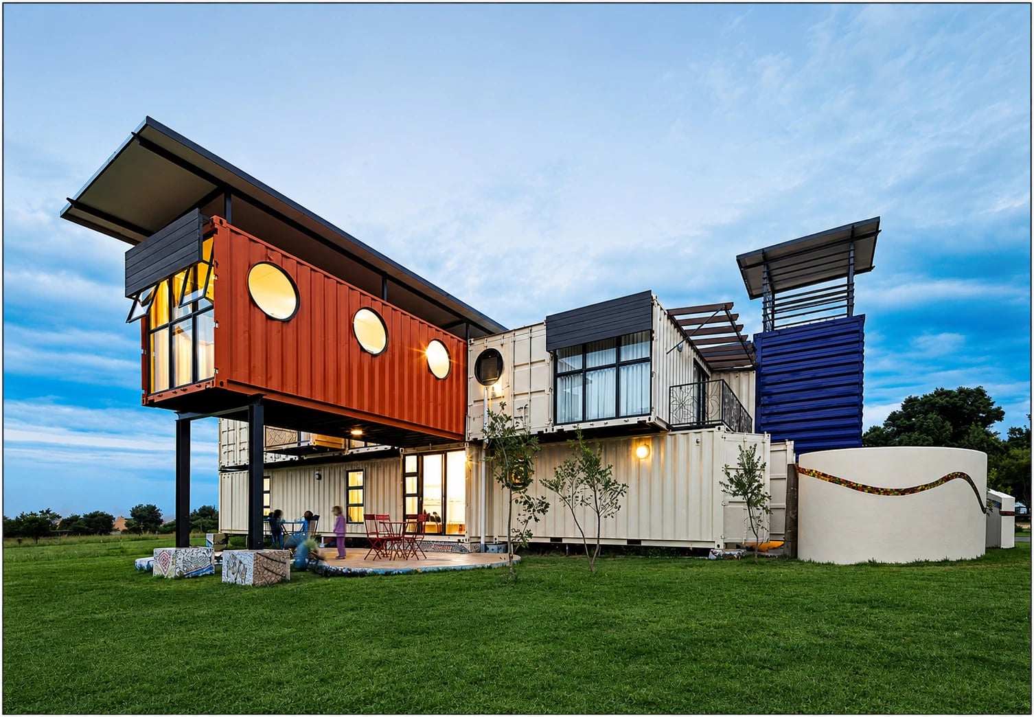The New Jerusalem children's home by A&A Containers, a multi-container building with a cantilevered upper volume and porthole windows, Gauteng, South Africa